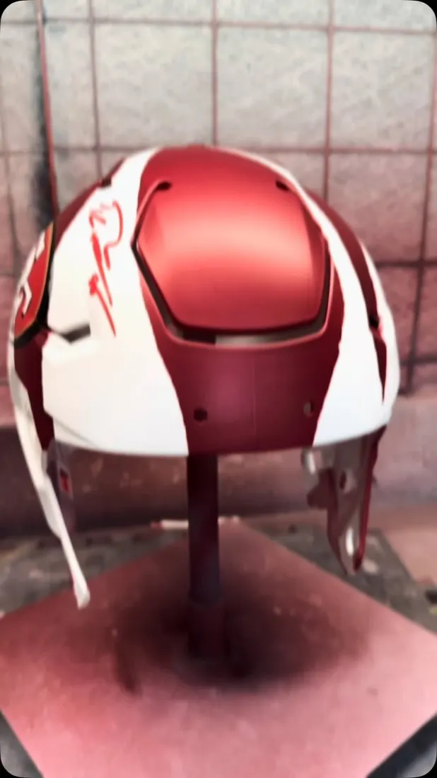 Custom-painted helmet in the Elite Custom Coatings paint booth